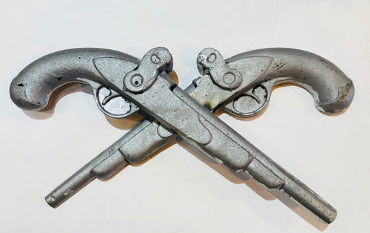 Jean Lafitte Pistols by Candice Alexander, Louisiana Artist. Re Creation of the i10 Calcasieu River Bridge Aluminum