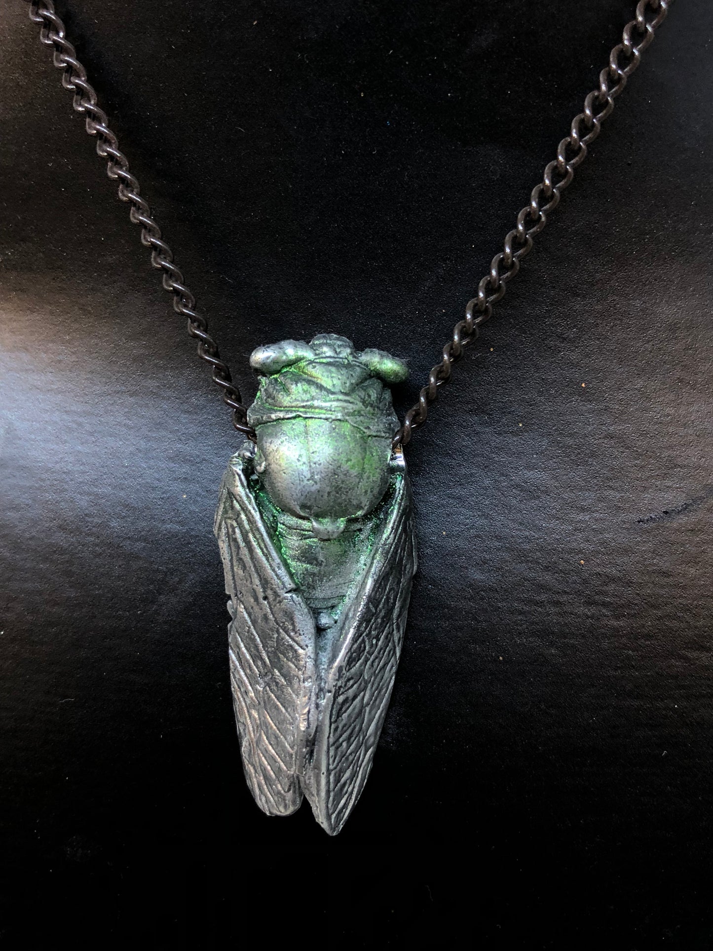 Locust necklace by Candice Alexander, louisiana and fleur de lis artist